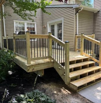 Outdoor living spaces by Vision Home Remodeling L.L.C.